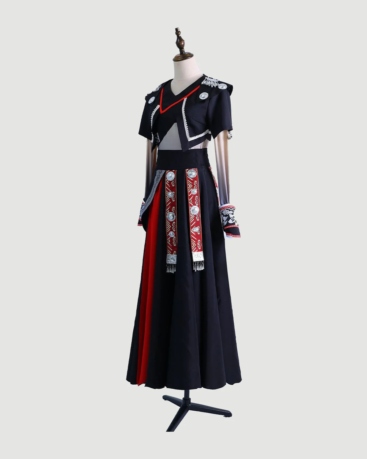 Black & Red Ornamented Dance Ensemble — studio cover on a dress form